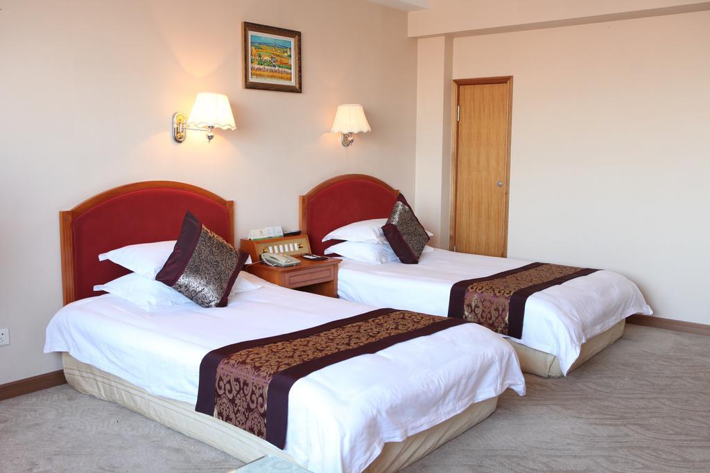 Tianhong Hotel Heze Quarto foto