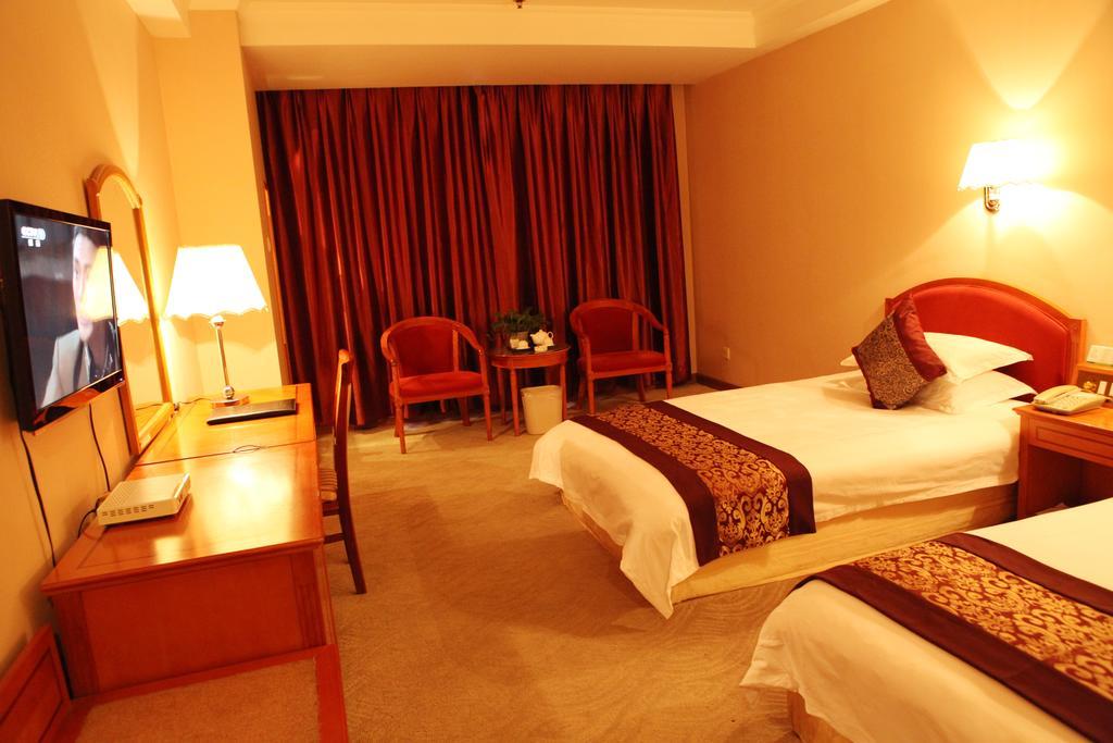 Tianhong Hotel Heze Quarto foto