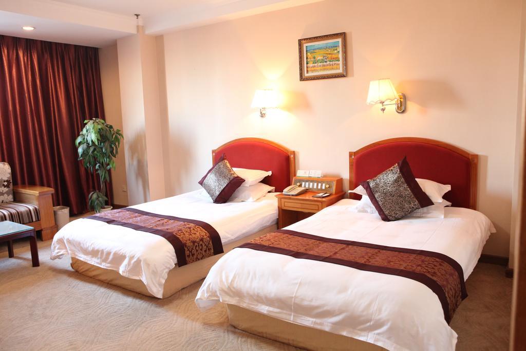 Tianhong Hotel Heze Quarto foto