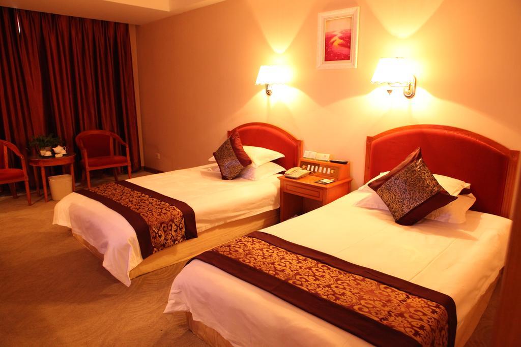 Tianhong Hotel Heze Quarto foto
