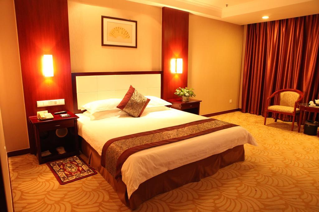 Tianhong Hotel Heze Quarto foto
