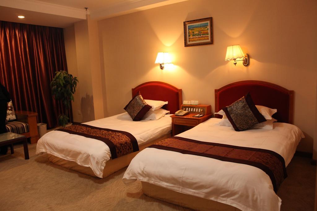 Tianhong Hotel Heze Quarto foto