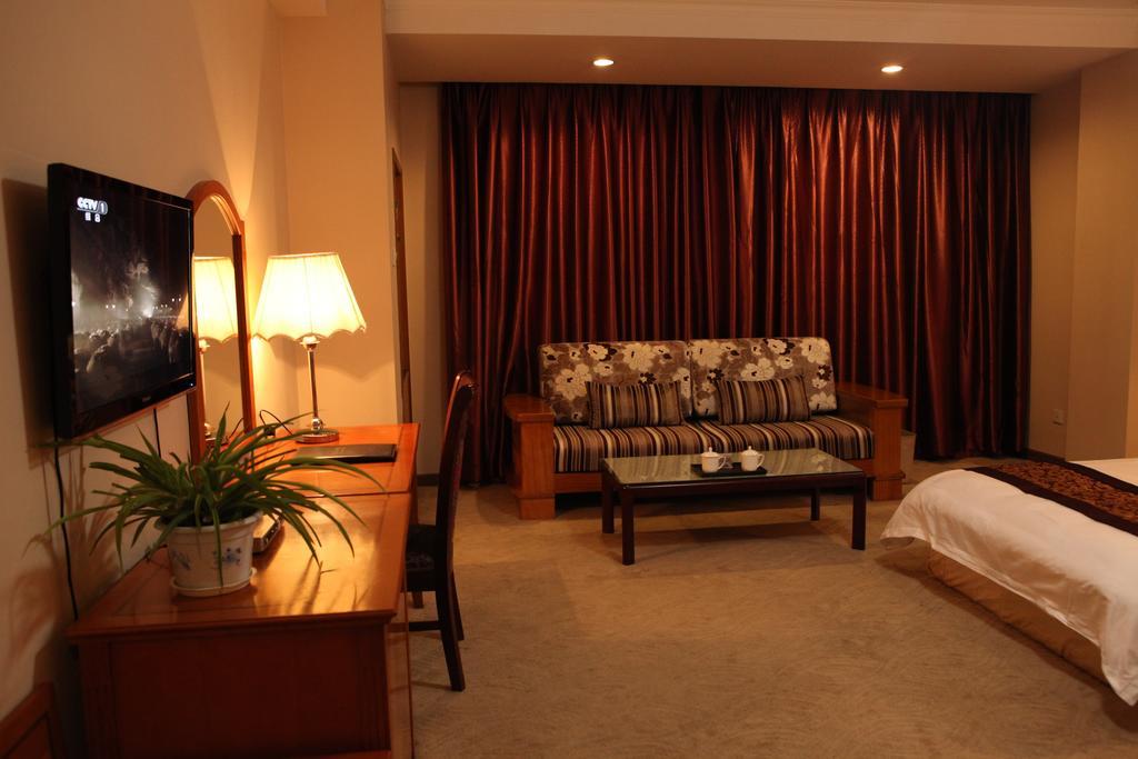Tianhong Hotel Heze Quarto foto