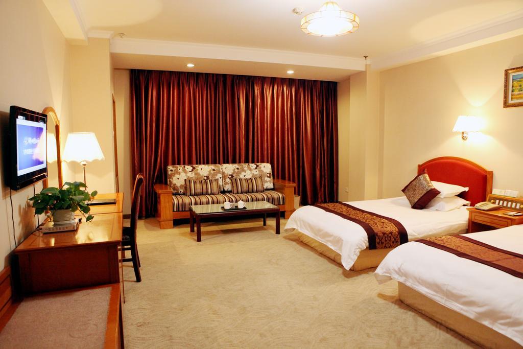 Tianhong Hotel Heze Quarto foto