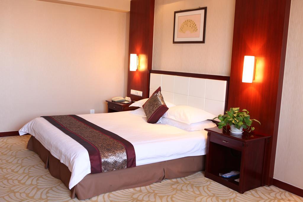 Tianhong Hotel Heze Quarto foto